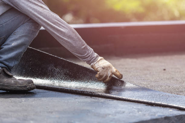 Professional Basement Waterproofing technician working in Malone, WI